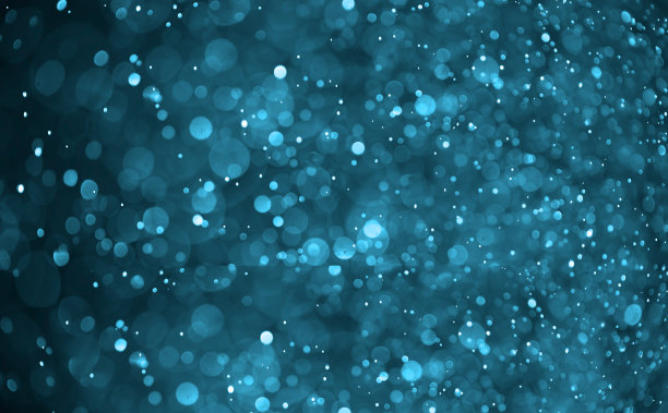 绿色离焦闪光背景。图片下载