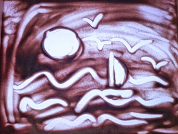 沙艺术抽象画的一艘游艇在海浪与海鸥和太阳图片下载