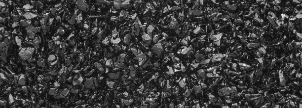 表面污垢粗糙的黑色沥青纹理，沥青路面石纹理背景黑色花岗岩砾石，俯视图图片下载