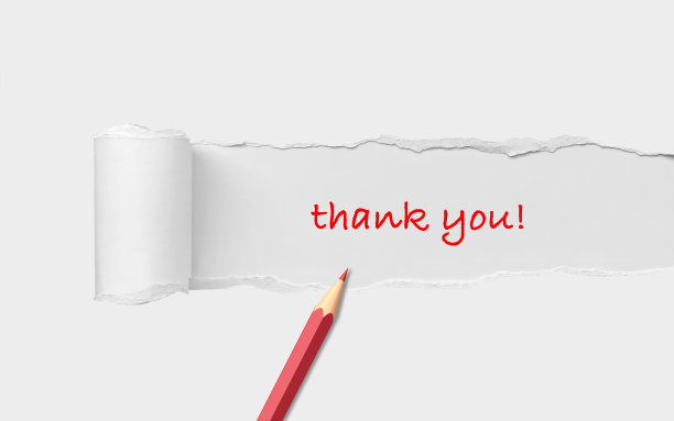 用红铅笔写在撕碎的白纸上的感谢图片下载