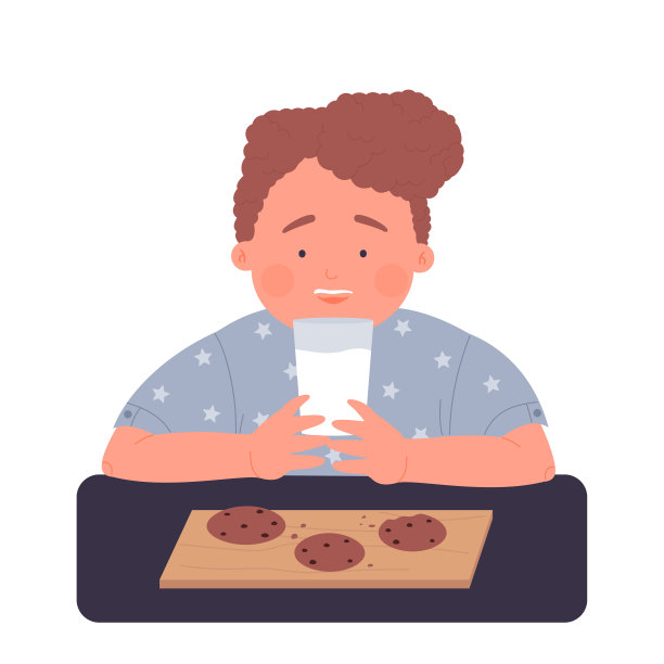 小男孩边吃饼干边喝牛奶图片下载