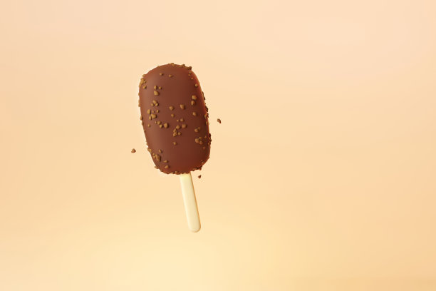 会飞的冰淇淋巧克力棒，黄色背景有杏仁图片下载