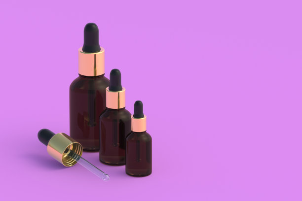 皮肤护理精华液滴管瓶在粉红色的背景。副本的空间。三维渲染图片下载