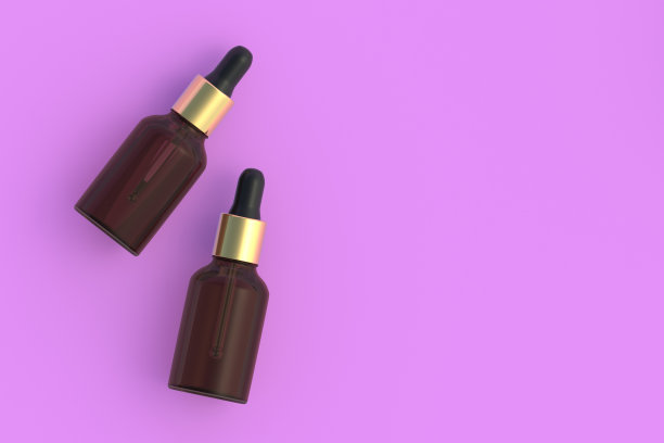 粉色底色的精油瓶。前视图。副本的空间。三维渲染图片下载