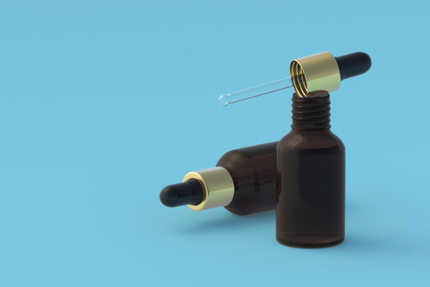 皮肤护理精华液滴管瓶，蓝色背景。副本的空间。三维渲染图片下载