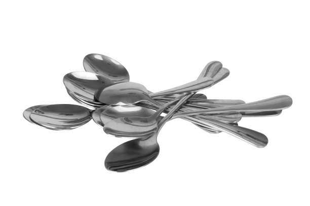 勺子堆银许多孤立在白色的背景图片下载