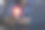 节能概念的商人拿着一个亮着灯的灯泡在笔记本电脑上图片下载