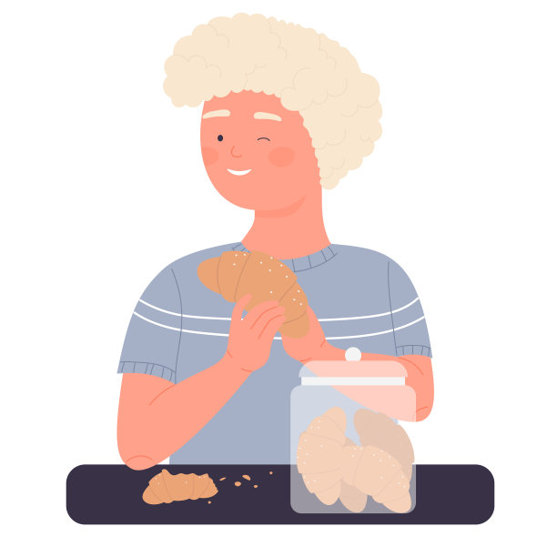 小男孩在吃牛角面包图片下载