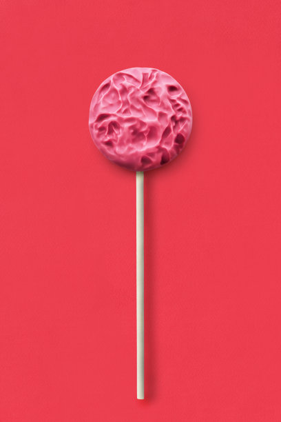 红色背景上的棒棒糖图片下载