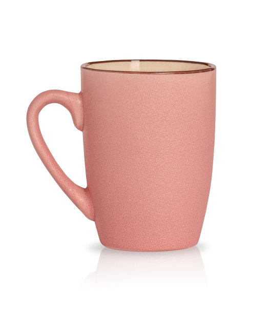 粉红色杯子孤立在白色背景。图片下载