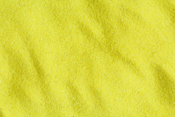 背景/纹理制成的装饰黄沙晶体。背景与沙丘图片下载