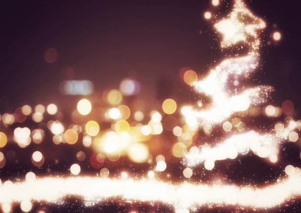 一棵圣诞树在夜空中闪闪发光的插图图片下载