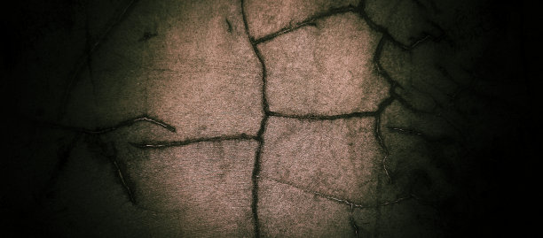 可怕的黑色水泥纹理作为背景，旧的混凝土墙充满了划痕图片下载