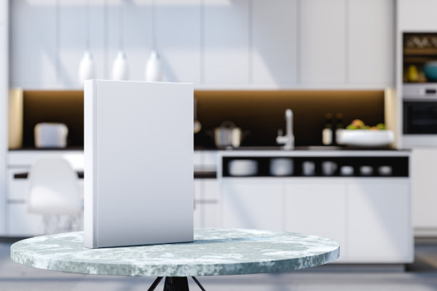 3 d演示。厨房的桌子上放着一本空白精装书。本模型。图片下载