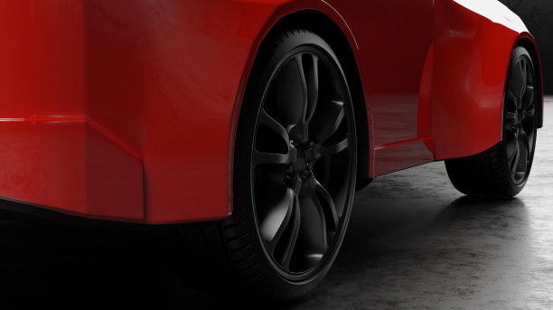 红色运动型SUV越野车在黑暗中行驶图片下载