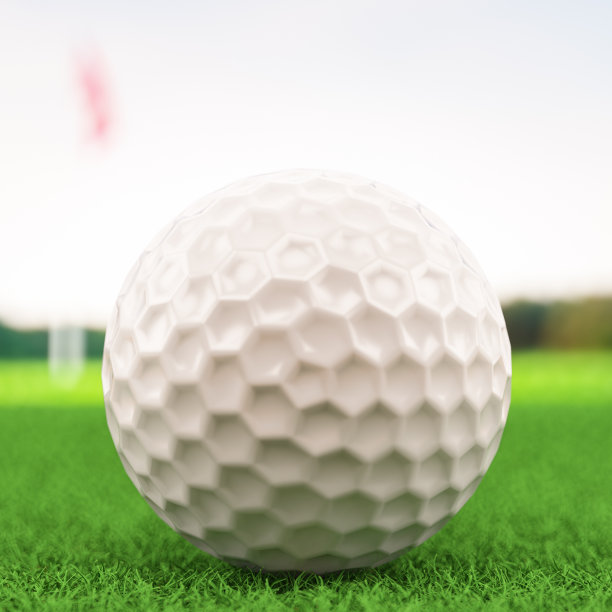 草地上的高尔夫球特写图片下载