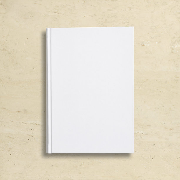 大理石桌子上合着一本空白的书图片下载