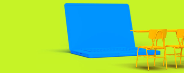 课桌前蓝色笔记本电脑，侧视图图片下载