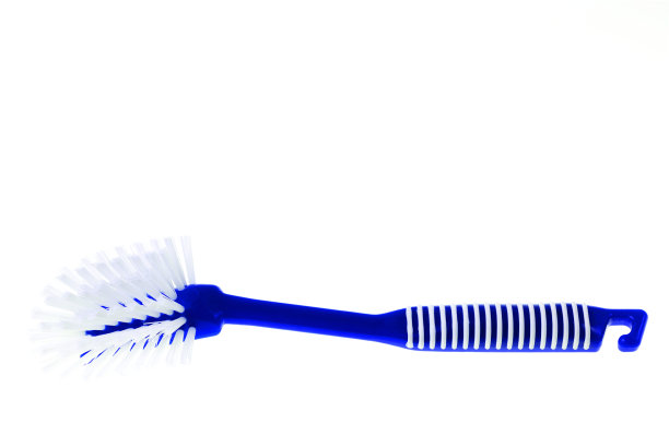 盘子刷孤立在白色背景的近距离观察。图片下载