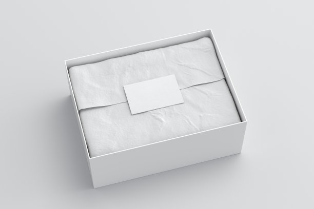 礼品盒模型。白色礼品盒，空白标签或名片上的包装纸。白色背景。侧视图。图片下载