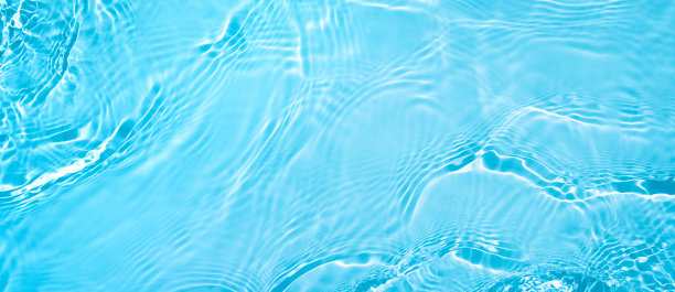 透明的蓝色清澈平静的水面波纹理图片下载