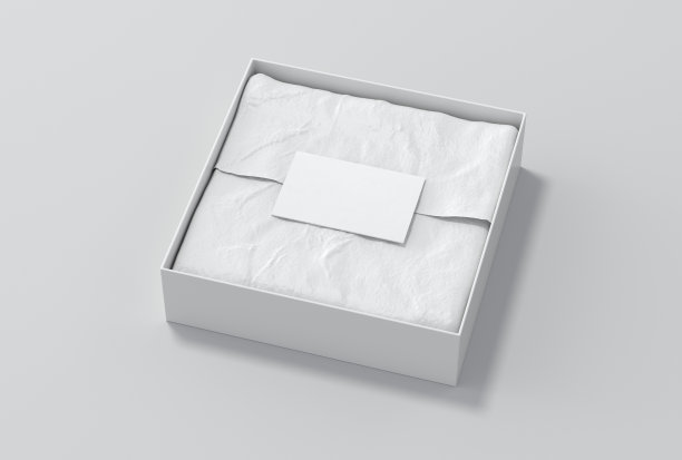方形礼盒模型。白色礼品盒，空白标签或名片上的包装纸。白色背景。侧视图。图片下载