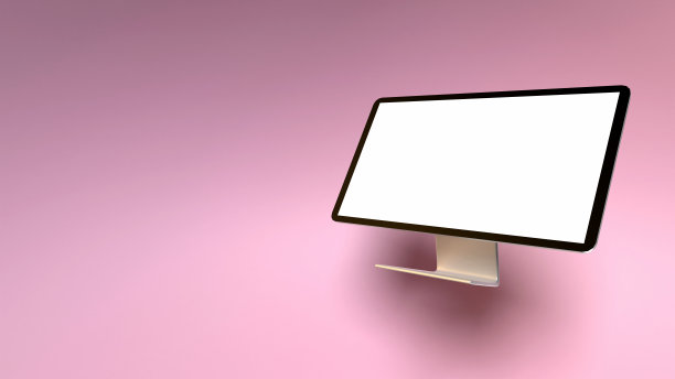 以粉红珊瑚为背景的台式电脑，回到学校和企业的概念图片下载