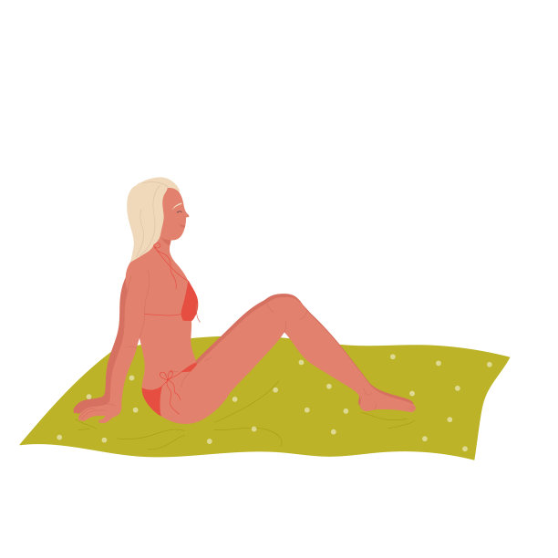 穿着泳装的金发女郎正在晒日光浴图片下载