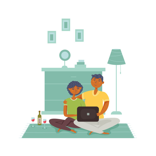 一对夫妇坐在地板上看着笔记本电脑图片下载