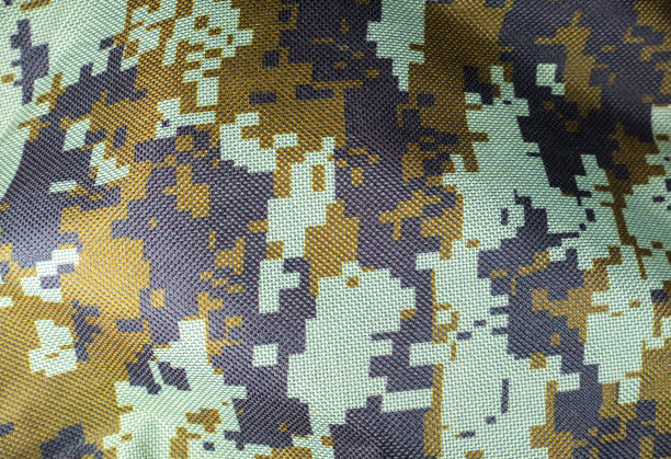 深绿色迷彩卡其纹理像素背景。军队和军事概念。图片下载