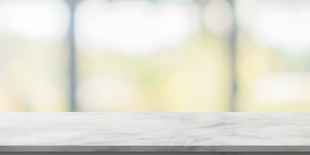 大理石桌面与模糊的厨房咖啡馆餐厅内部背景图片下载