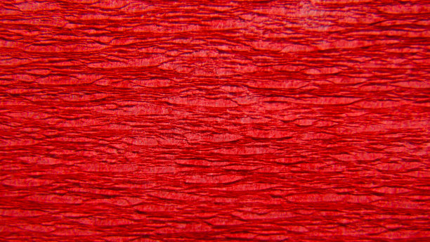 红色的纸张纹理或背景。红色油漆grunge纹理背景图片下载