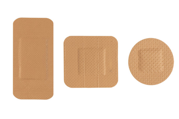 俯视图医学石膏隔离在一个白色的背景。医用贴片孤立于白色。急救物品。胶布绷带石膏图片下载