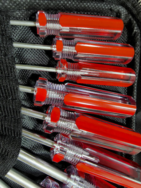 蓝领-工具-一套新的亮红色手柄螺丝起子。伟大的背景图像。父亲节和机械师。图片下载