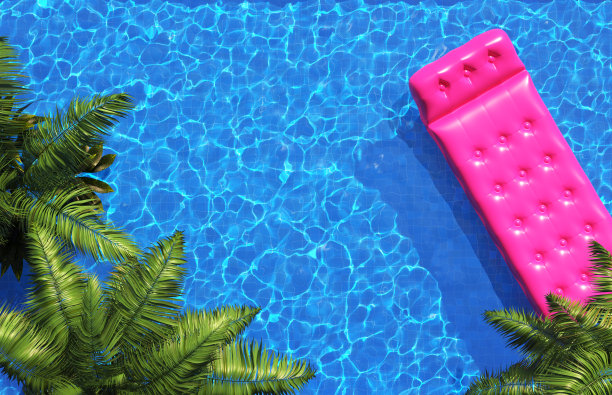 有粉色充气床垫和棕榈树的游泳池。泳池派对，夏日背景。图片下载