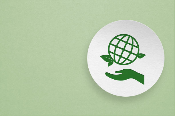 世界环境日，责任消费社会责任核心价值理念。绿色地球图标over hand over hand在白色圆形纸上剪纸与绿色背景包括复制空间图片下载
