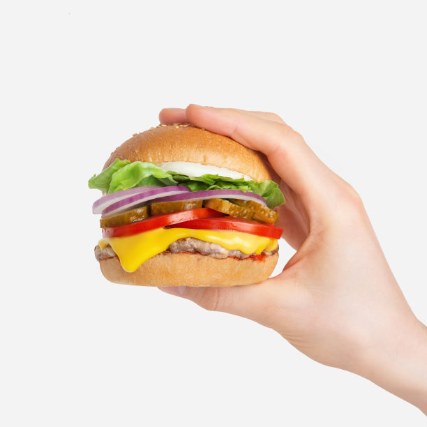 在白色孤立的背景下，手里拿着汉堡包图片下载