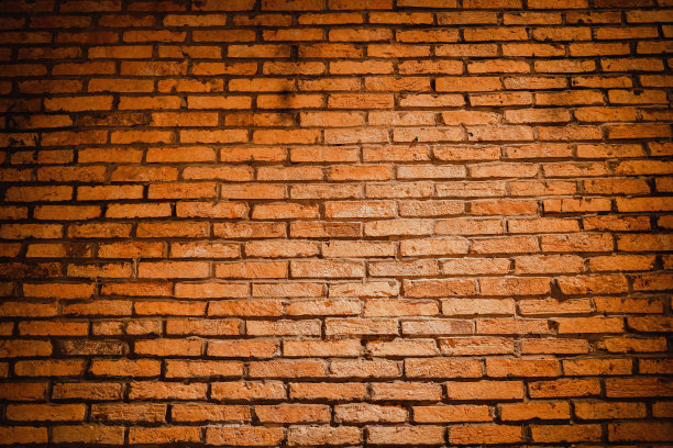 红砖墙。纹理的老棕色和红色砖墙背景。红砖墙的碎片特写。背景结构。铭文模板。模型的设计。图片下载
