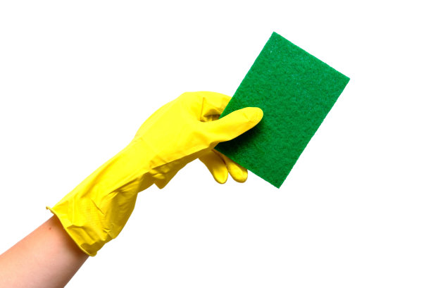 手戴黄色手套和海绵图片下载