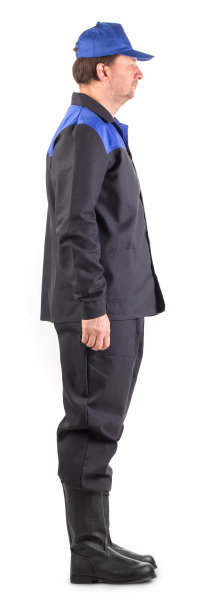 穿着工作服的工人。侧视图。图片下载