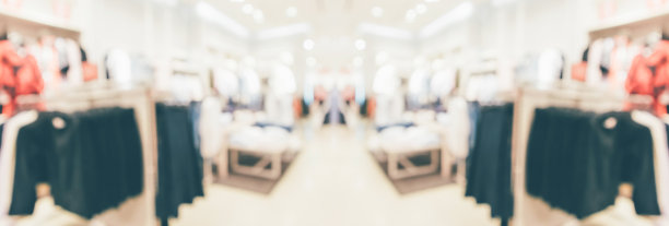 抽象模糊服装精品展示商场内部的背景图片下载