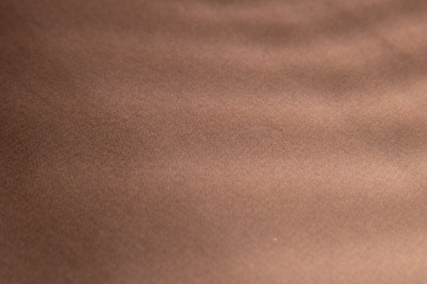 纸底色棕色配硬阴影，建筑图纸。模糊的背景。抽象的阴影的背景。作为设计模板，作为文字、广告的画布。图片下载