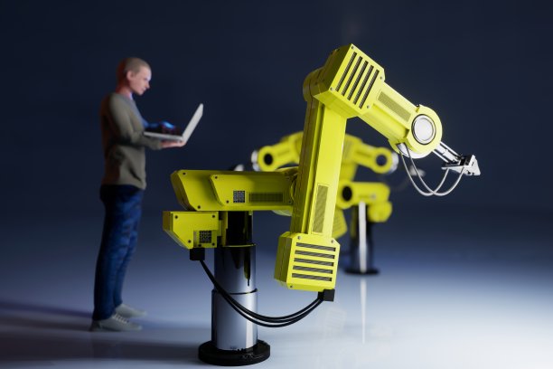 黄色机器人和工程师与笔记本电脑图片下载