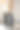 工作室系列形象的年轻女子米色丝绸长袍和黑色宽长裤图片下载