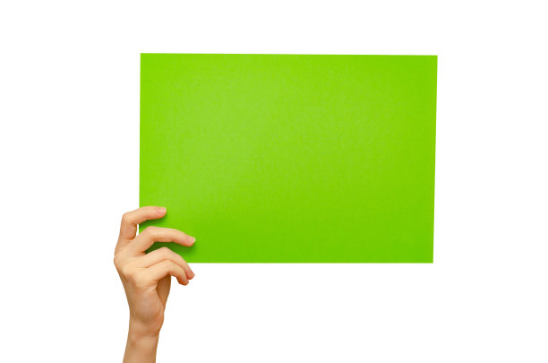 空的彩色海报在手。孤立在白色背景上。本空间图片下载