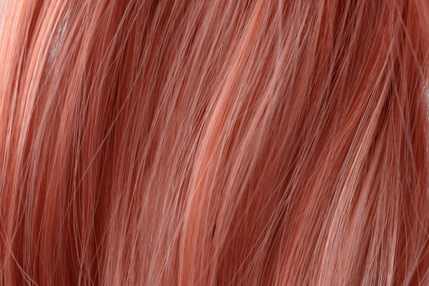 红色卷发纹理特写。图片下载