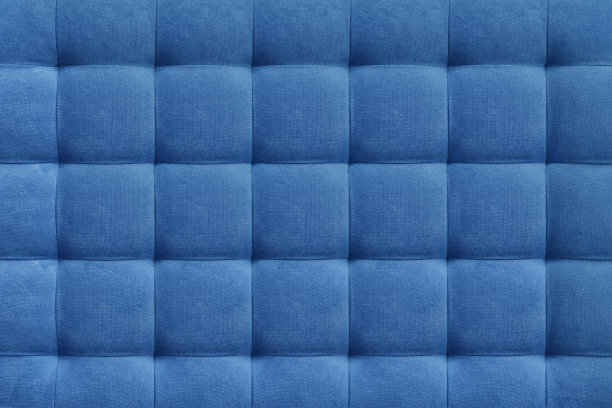 蓝色麂皮皮革背景，经典的方格图案的家具，墙壁，床头板图片下载