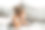 刚学步的小女孩躺在家里的沙发上玩数字无线平板电脑。宝宝的孩子成长与在线应用程序。儿童和电子设备的概念。婴儿肖像与智能手机。教育学习理念。图片下载