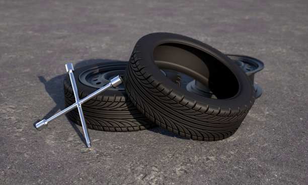 轮胎和轮辋用扳手在沥青上图片下载