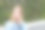 一个金发碧眼的欧洲女孩，穿着牛仔夹克坐在公园里，想做白日梦，她的手放在头上特写肖像的右边，有一个地方可以铭文。人类的情感图片下载